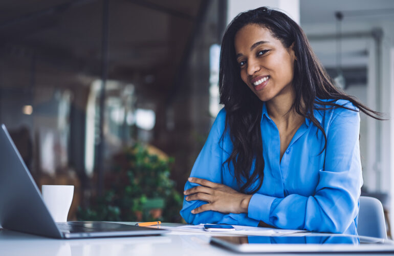 Business woman sitting at a desk